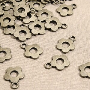 청동 지퍼장식 지퍼텍 데이지 50개입 (개)